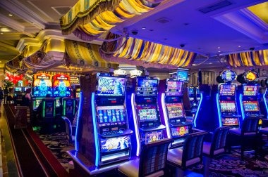 Slot game interface showing five reels, paylines, and bet controls on kembang128 slot